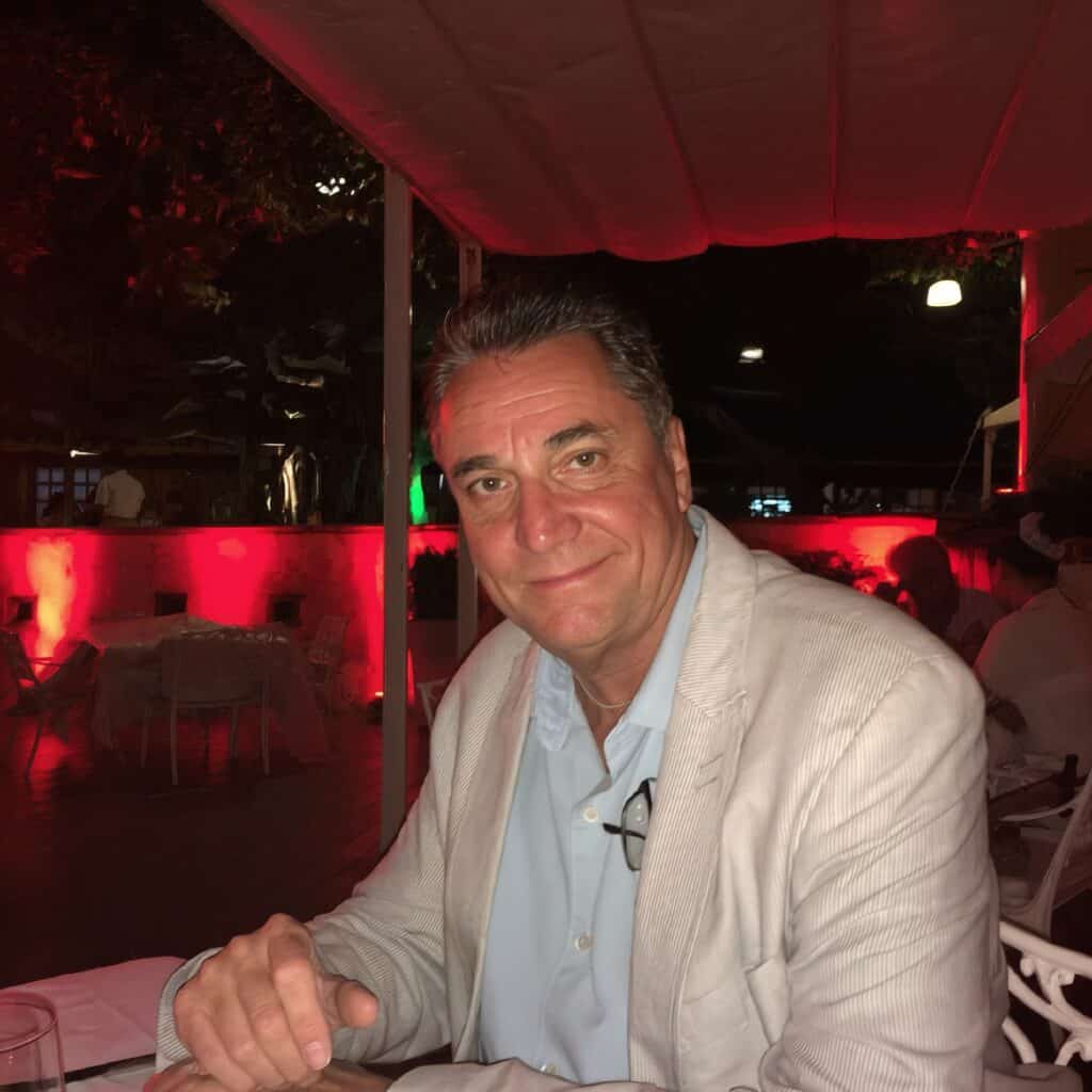 Man enjoying outdoor dinner during flood safety awareness event.